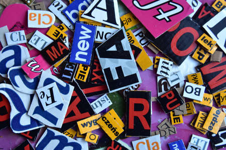 Background with multi-colored and different size letters.の写真素材