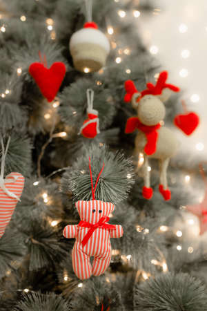 Christmas tree decorated with handmade toys.の写真素材