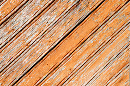 Wooden background from old painted boards. the facade of the old building with copy space.の写真素材