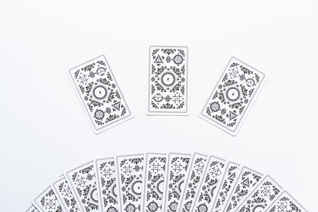 Layout of tarot cards on a white background. Tarot cards and esoteric concept. magic rituals.の写真素材