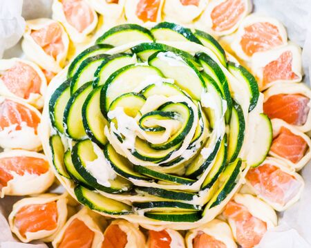 Zucchini and salmon puff pastry cake. backgroundの写真素材