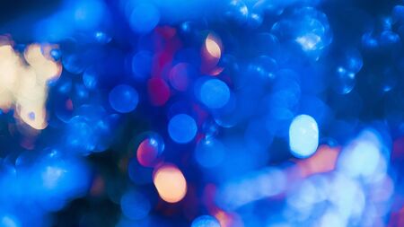 festive abstract background with bokeh defocused lights.の写真素材
