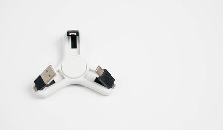 usb spinner. Top view of composition with spinner. Flat lay white background.