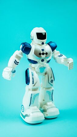 baby toy on blue background, copy space.