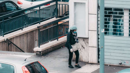 Rome Italy, March - 13, 2020. Man in a protective mask against infectious diseases and as a...