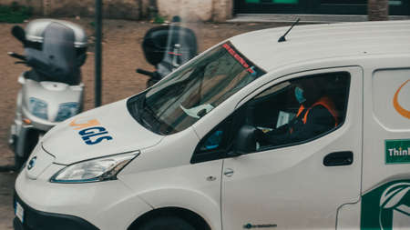 Rome Italy, March - 13, 2020. Man in a protective mask against infectious diseases and as a...
