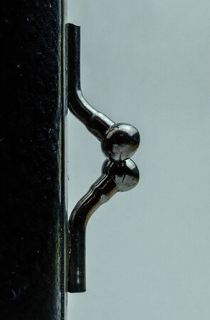Purse for coins. Wallet for change. Closed leather purse closeup on background. clasp on the wallet closeup.の写真素材