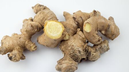 fresh ginger root isolated on white background.