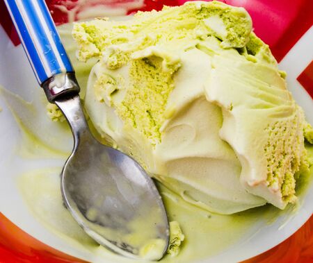 Homemade green organic ice cream. Pistachio ice cream backgrounds.の写真素材