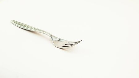 fork isolated on white background. metal fork. vintage fork cutlery side view.