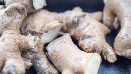 Ginger, zenzero, still life food. background of ginger roots grown in the Indian soil.