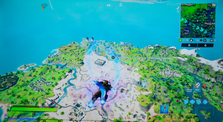 Rome Italy, December 14, 2020. Fortnite seen on the TV in the background, Fortnite is an online...