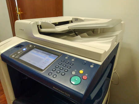 The photocopier or network printer is office worker tool equipment for scanning and copy paper