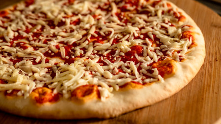 Pepperoni Pizza with Mozzarella cheese, salami, Tomatoes, pepper, Spices and Fresh Basil. Italian pizzaの写真素材