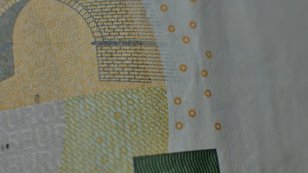 Close up macro detail of EURO money banknotes, detail photo of EURO. World money concept, inflation...