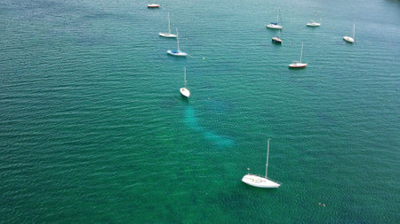 Panoramic view of Lake Bracciano near Rome, Italy. from a birds eye view. white sailboats, drone...