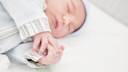 Close-up of a beautiful sleeping baby on white