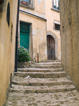 stairs up in a narrow street in Italy.の写真素材