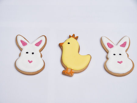 Egg shaped Easter cookies isolated on a white background. Cookies depicting a chick, a rabbit