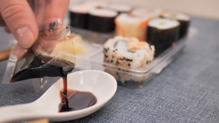 eating sushi in a restaurant. close upの写真素材