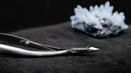 Beautiful nail clippers on a black background, nail clippersの写真素材