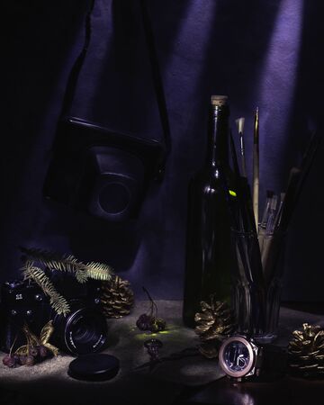 Themed photo with bottles, thread, cameras and basketsの写真素材