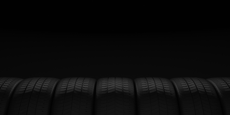 Car tires on black backgroundの写真素材