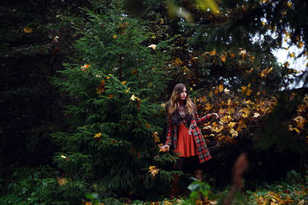 Magnificent charming gipsy woman staying outdoor	の写真素材