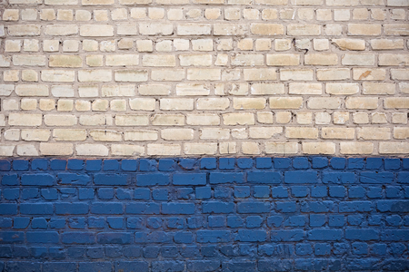 Background of white and blue brick wall textureの写真素材