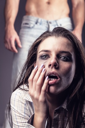 Fear of woman victim of domestic violence and abuseの写真素材