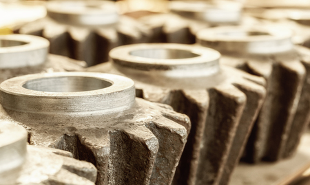 Closeup of blank interconnected industrial metal gearsの写真素材