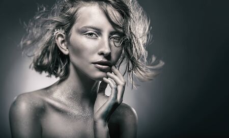 Portrait of a beautiful sexy woman with natural make-up. Black-and-white glamor pictureの写真素材