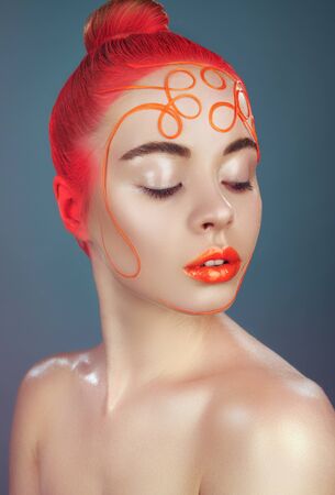 High fashion model. Amazing woman with orange hairstyle and lipsの写真素材
