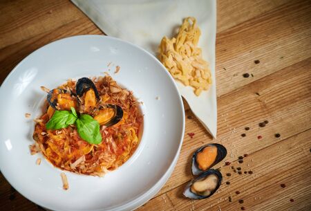 Pasta with seafood. Tagliatelle with musselsの写真素材