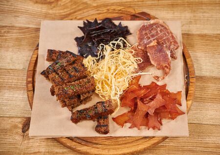 Beer plate in restaurant. Snacks to beerの写真素材