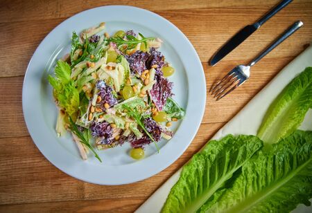 Healthy fresh Waldorf salad with apples, celery and pine nuts. Top viewの写真素材