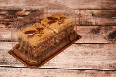 small cake in a transparent box for sale in stores