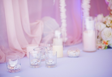 Making handmade for wedding decoration. Candles in glass flasks. Closeの写真素材