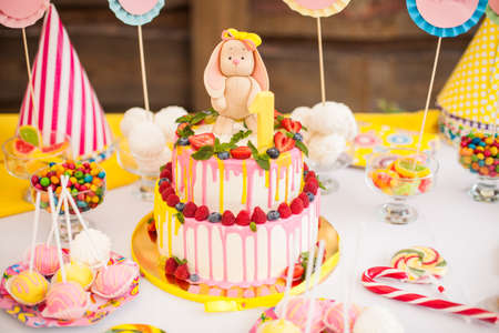 The two-storey cake for children's birthday with a hareの写真素材