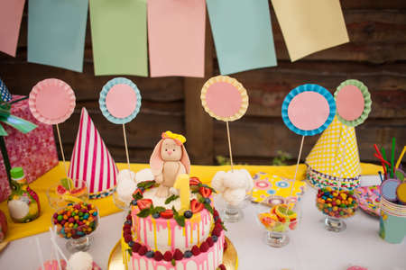 The two-storey cake for children's birthday with a hareの写真素材