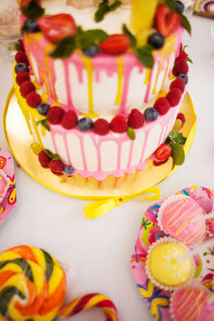 The two-storey cake for children's birthday with a hareの写真素材