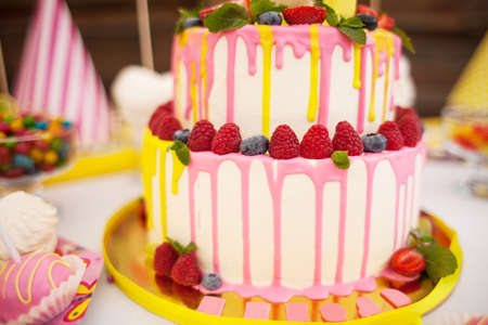 The two-storey cake for children's birthday with a hareの写真素材