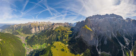 Serpentine in the Italian Alps mountains. Gardena pass,Passo Gardena, Rifugio Frara, Dolomiti, Dolomites, South Tyrol, Italy, Aerial amazing shot. View from above.の写真素材