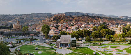 Tbilisi, Georgia. Panoramic beautiful picture of Cityscape Of Summer Old Town. Central Part Of City...