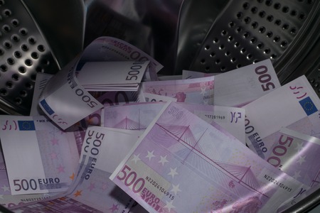 Financial crisis. Money laundering: money in the washing machine.