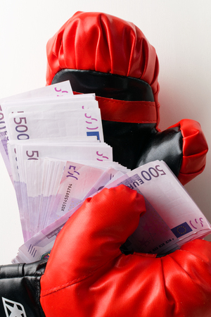 boxing for money, boxing glove with cashの写真素材