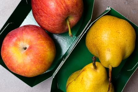 Pear apple isolated on grey background as package design element. Organic fruits. Top viewの写真素材