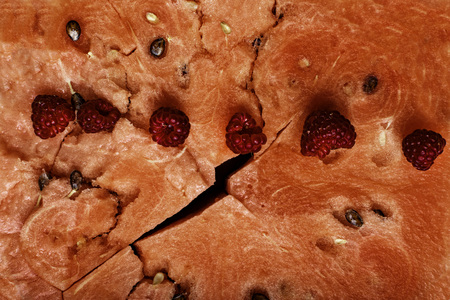 background of Red texture of fresh sweet watermelon and raspberryの写真素材