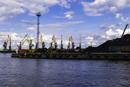 Working crane in the port, coal terminal, containersの写真素材