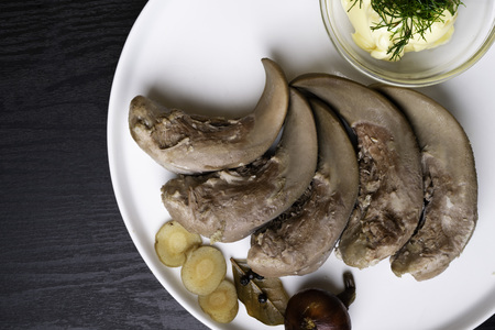boiled pork and beef tongue in white plateの写真素材